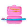 Orthodontic set for care of braces with a monobundle brush, pink